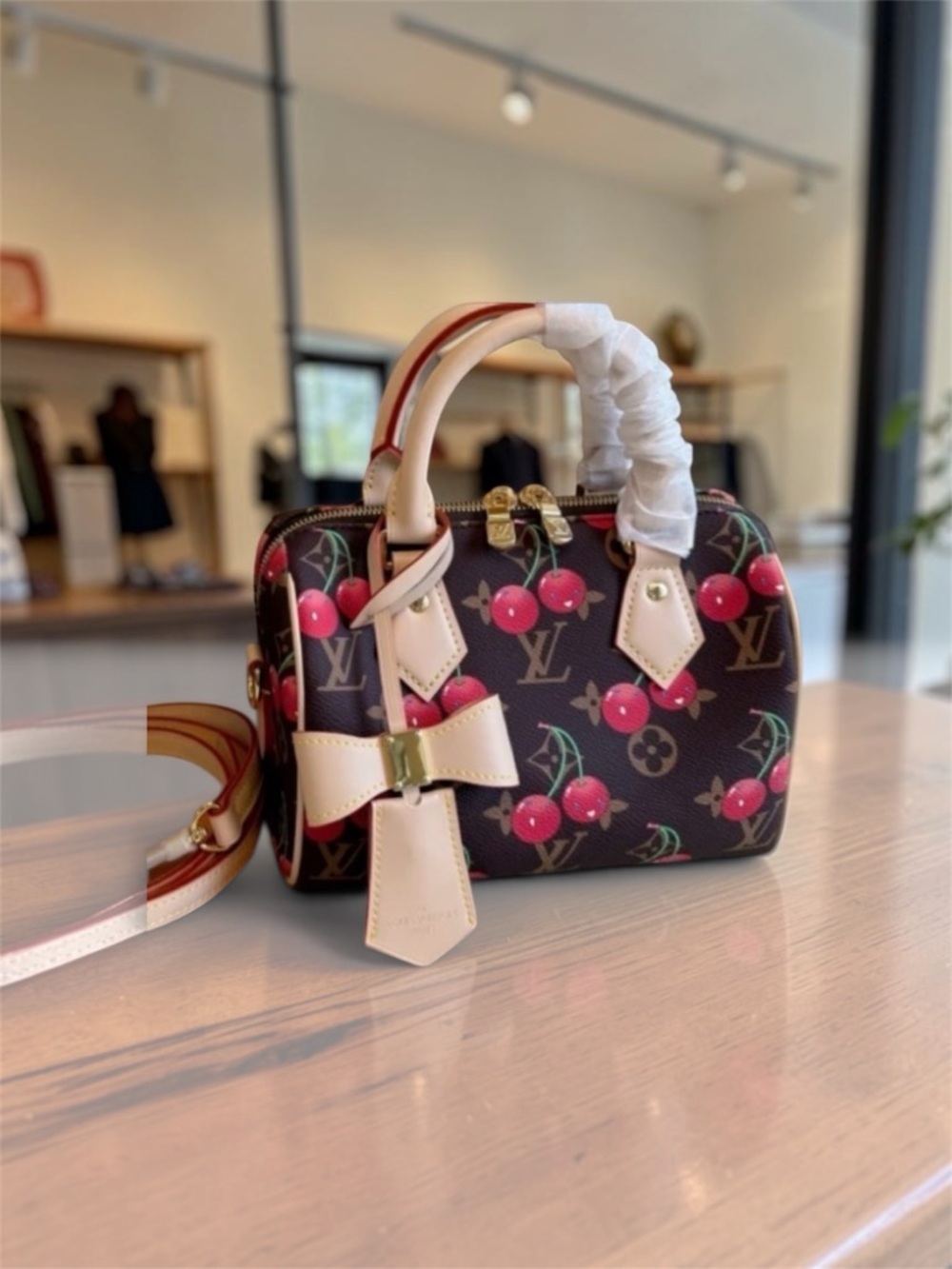 Cherry Print High End with Bow Accent, Lock, Key, and Shoulder Strap. Small Bag.